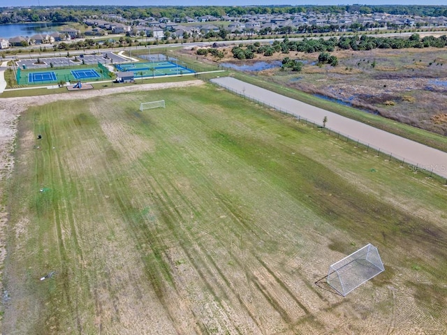 aerial view featuring a rural view and a water view