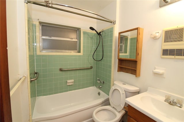 bathroom featuring shower / bath combination, a wall unit AC, toilet, and vanity