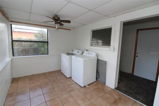 laundry room with washing machine and dryer, laundry area, ceiling fan, and concrete block wall