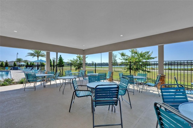 view of patio / terrace featuring a community pool