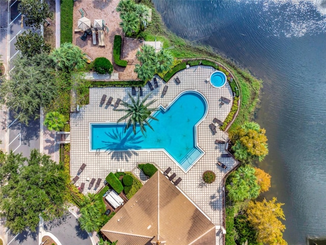 drone / aerial view with a water view