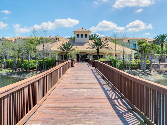 rear view of house with a water view