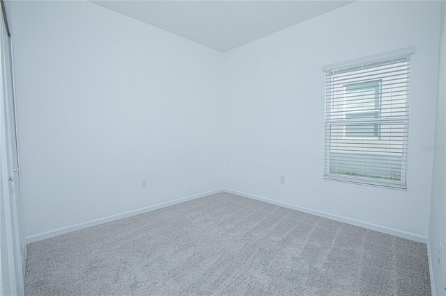 spare room with carpet floors