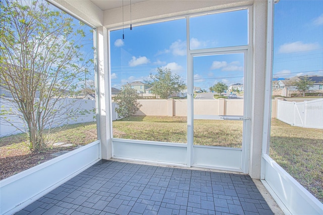 view of unfurnished sunroom