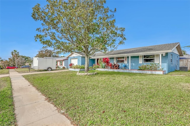 single story home with a front yard, a garage, and cooling unit