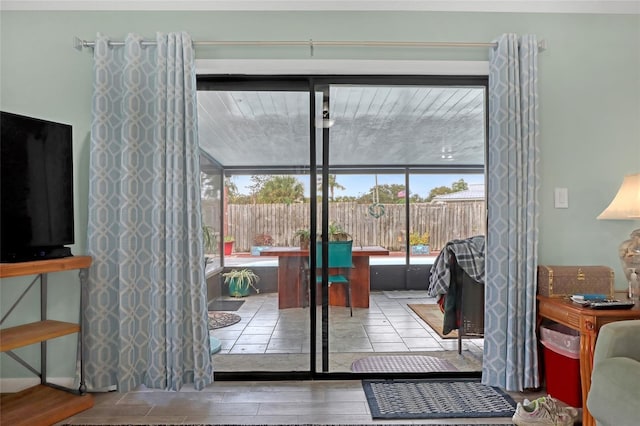 doorway with light hardwood / wood-style flooring