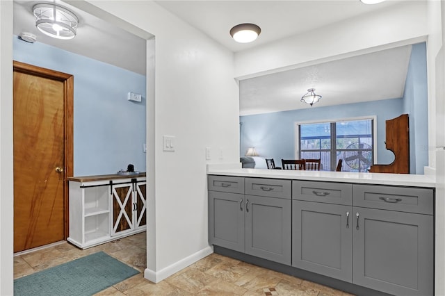 kitchen featuring gray cabinetry