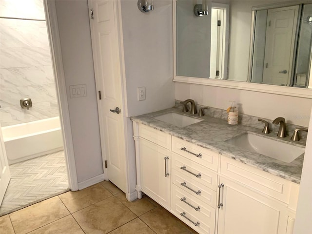 bathroom featuring tile patterned flooring and vanity