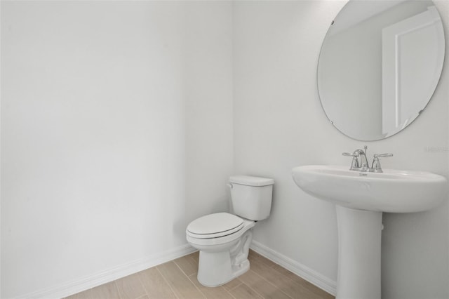 bathroom featuring toilet