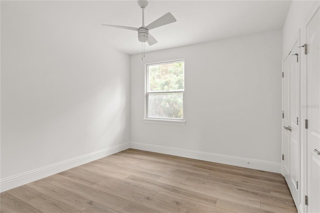 unfurnished bedroom featuring ceiling fan and light wood-type flooring