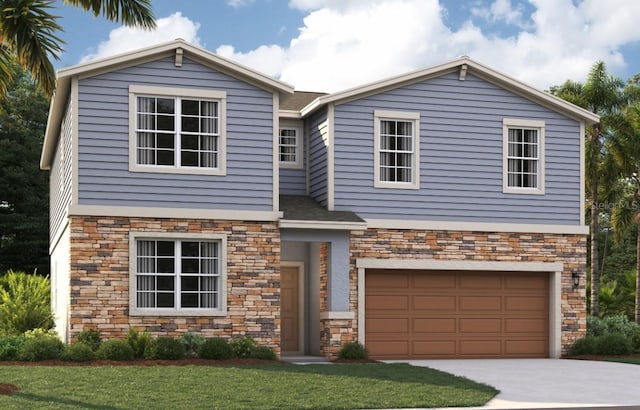 view of front facade with a front yard and a garage