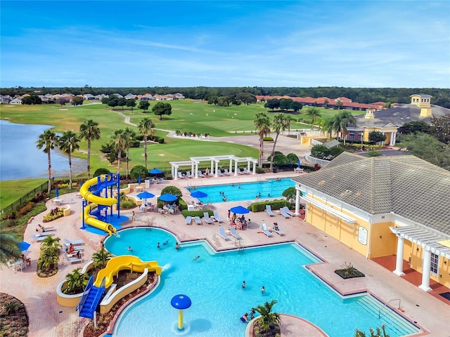 view of pool featuring a water slide