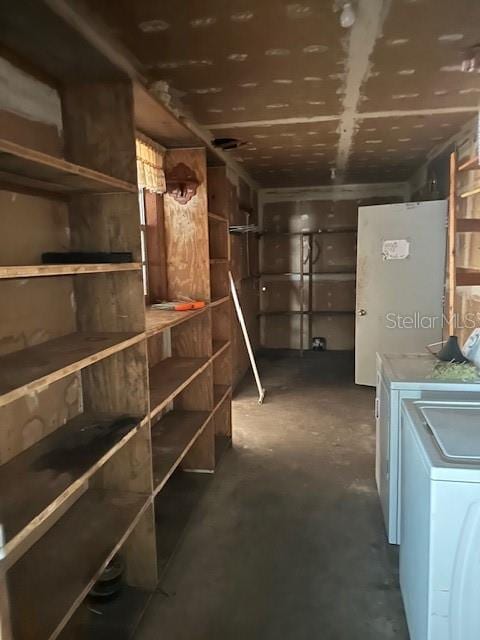 storage area featuring separate washer and dryer