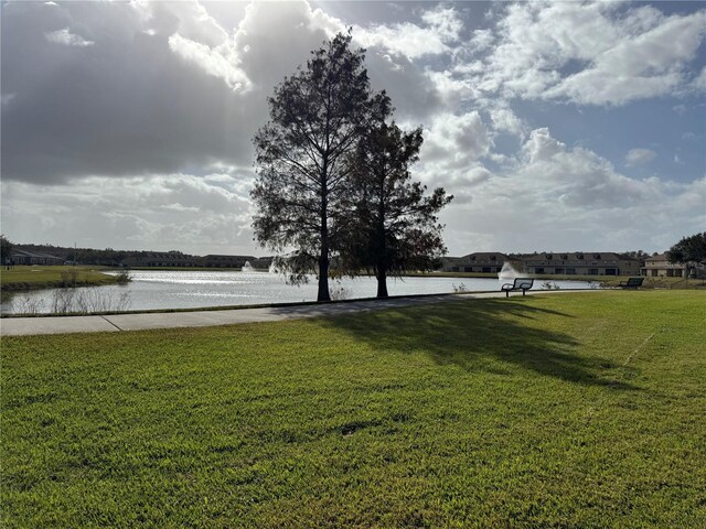 view of yard with a water view