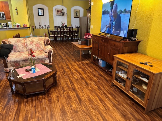 living room with dark wood-type flooring