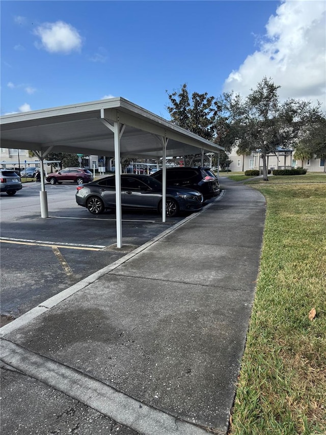 view of car parking featuring a carport