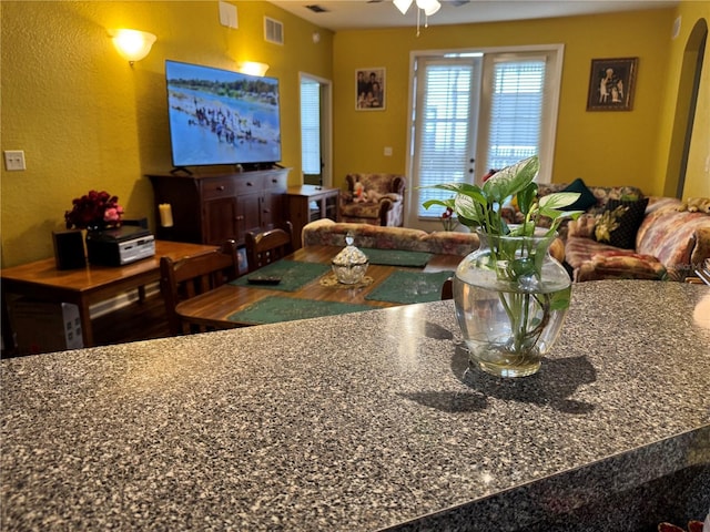 living room with ceiling fan