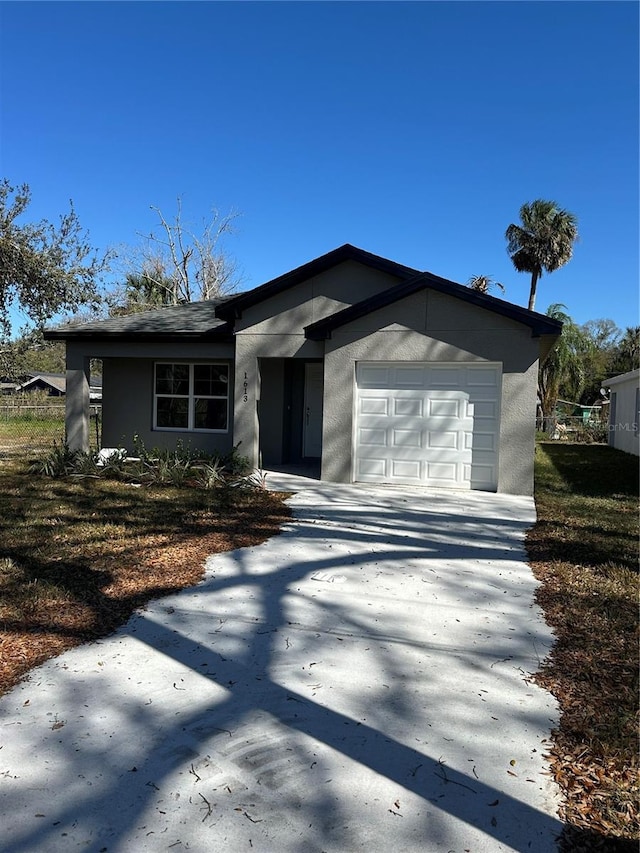 view of front of home with a garage