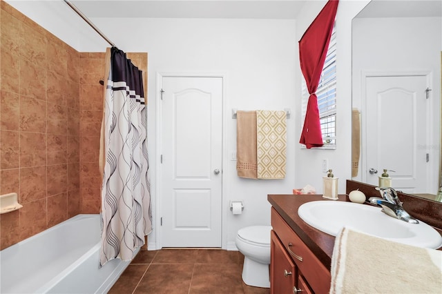 full bathroom featuring toilet, vanity, tile patterned floors, and shower / bathtub combination with curtain