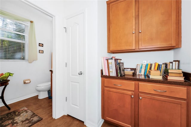 interior space with dark hardwood / wood-style floors