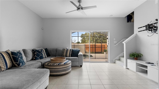 tiled living room featuring ceiling fan