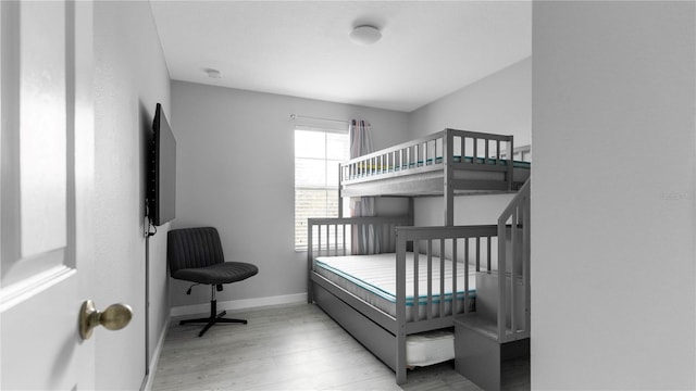 bedroom featuring light wood-type flooring