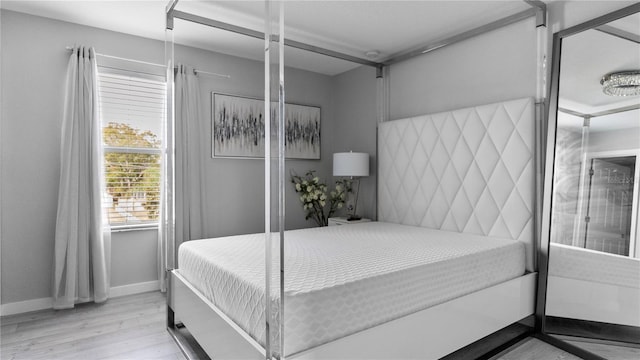 bedroom featuring light hardwood / wood-style flooring