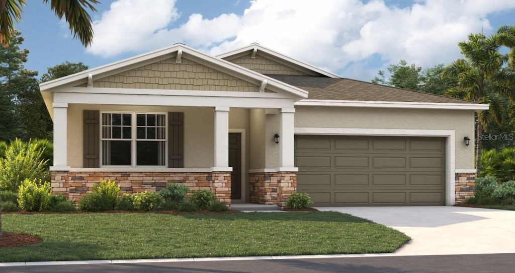 craftsman inspired home with a porch, a garage, and a front yard