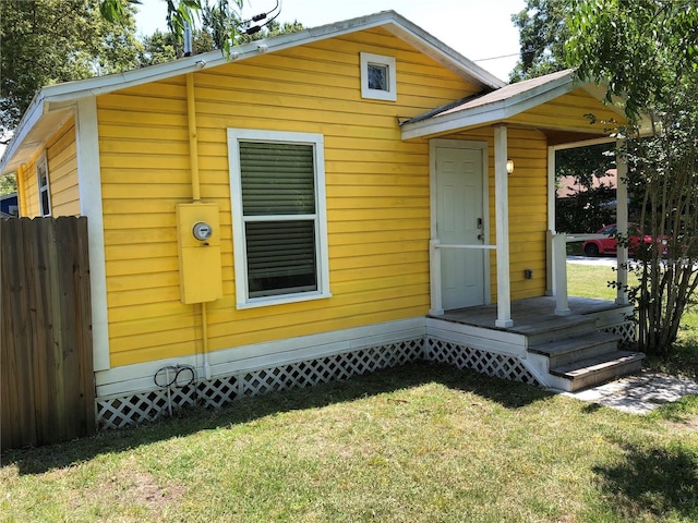 exterior space featuring a front lawn