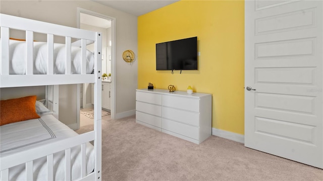 bedroom with light colored carpet