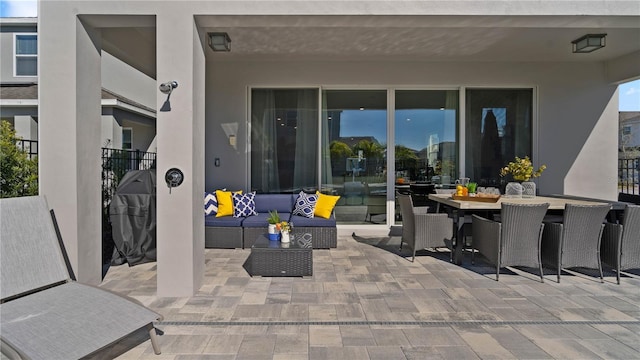 view of patio with an outdoor living space and area for grilling