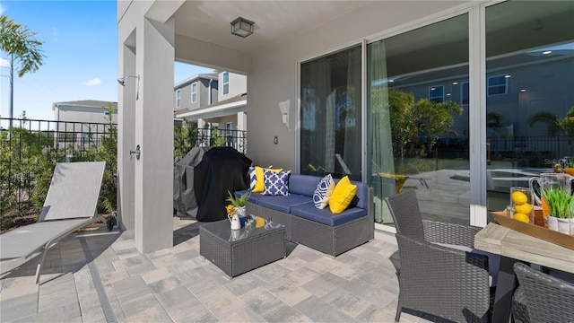 view of patio / terrace featuring an outdoor hangout area and grilling area