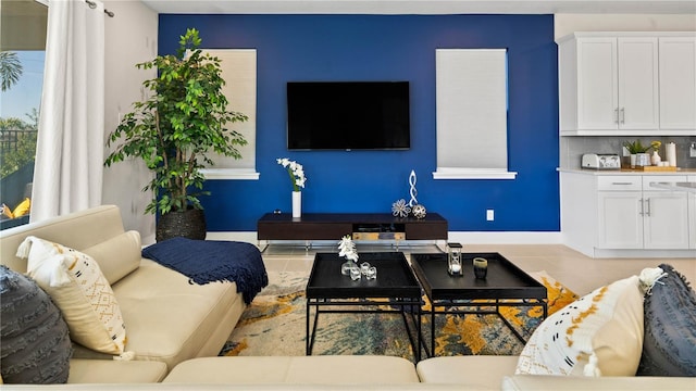 living room featuring light tile patterned flooring