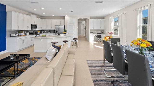 living room featuring sink