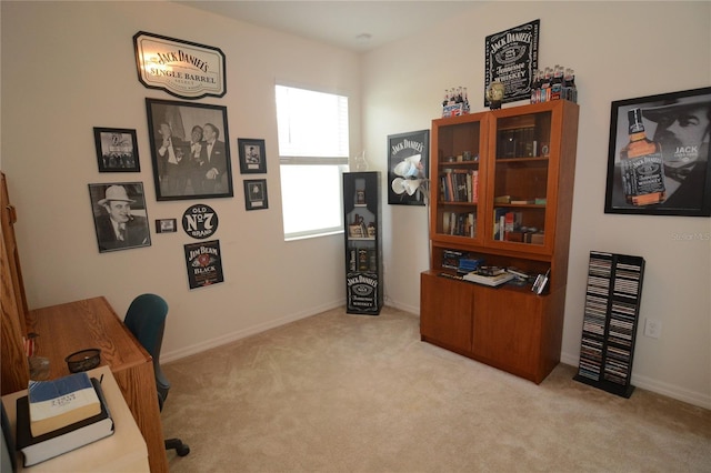 home office featuring light carpet