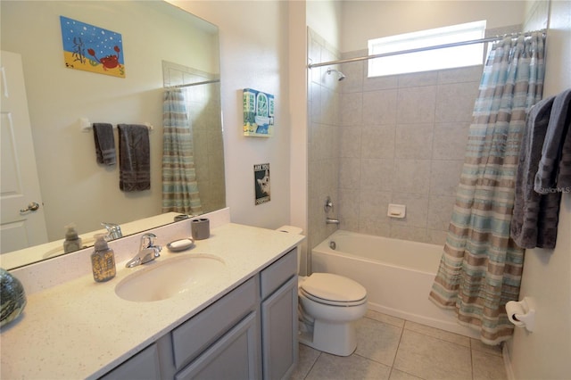 full bathroom featuring tile patterned floors, vanity, toilet, and shower / tub combo