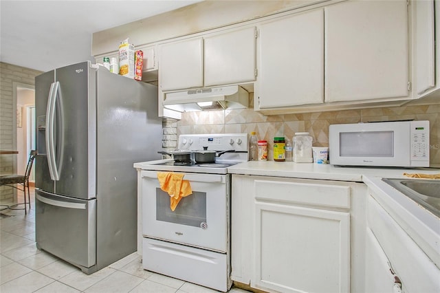 kitchen featuring light tile patterned floors, white cabinets, white appliances, and ventilation hood