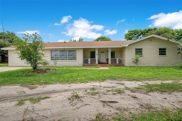 ranch-style home with covered porch