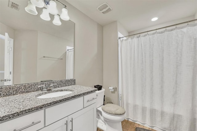 bathroom with vanity, wood-type flooring, toilet, and a shower with shower curtain