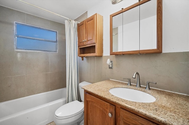 full bathroom with backsplash, vanity, shower / bath combo, and toilet