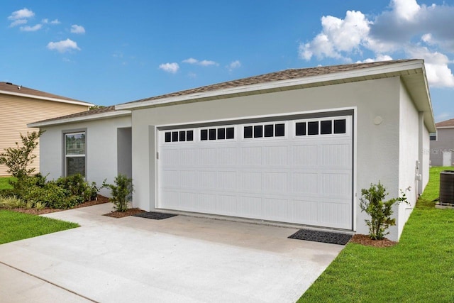 ranch-style house featuring a garage