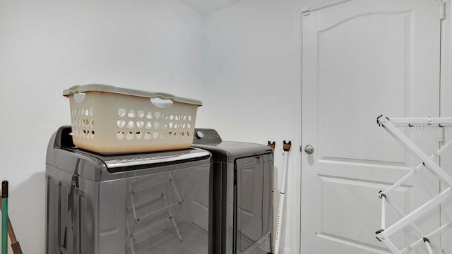 laundry room with washer and clothes dryer