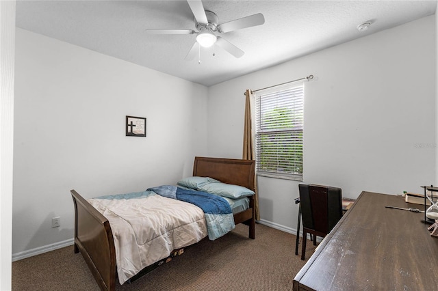 bedroom with ceiling fan and carpet