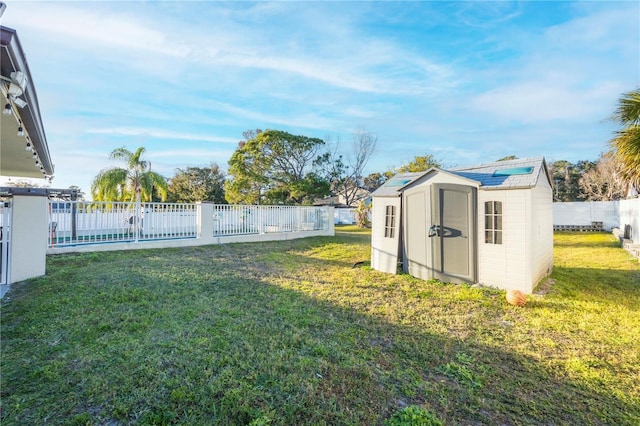 view of yard with a storage unit