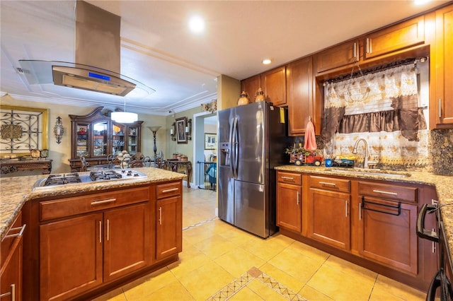 kitchen featuring sink, crown molding, appliances with stainless steel finishes, light stone counters, and island range hood