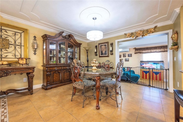 dining space featuring crown molding, an AC wall unit, and light tile patterned flooring