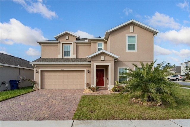 view of front of home with a garage