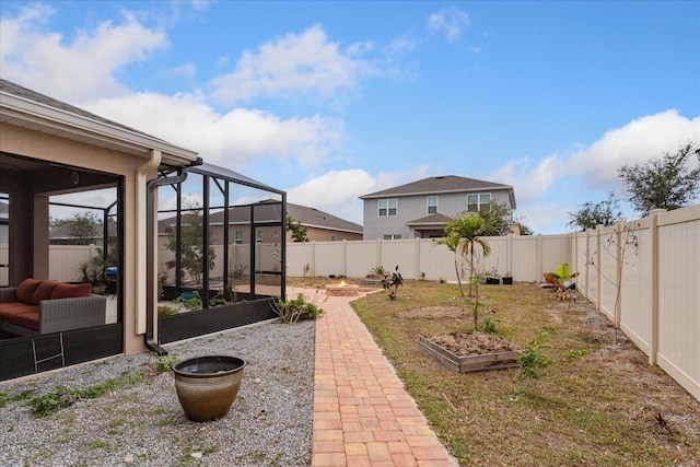 view of yard with a lanai