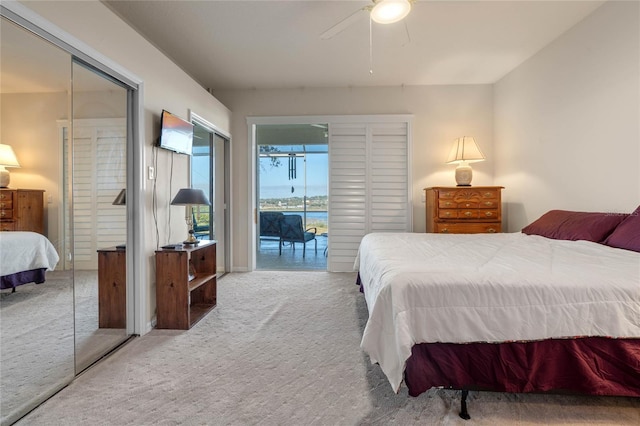 bedroom featuring ceiling fan and carpet