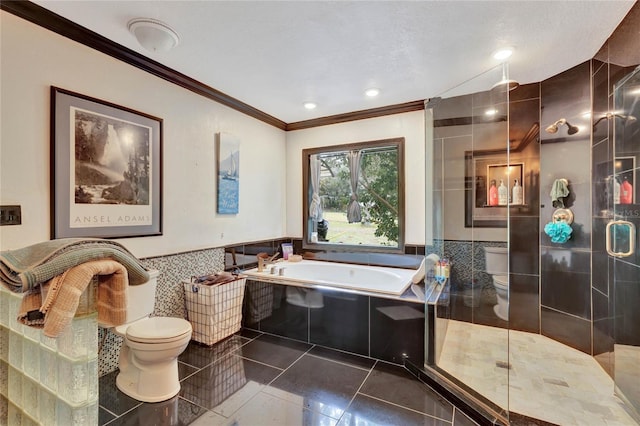 bathroom featuring ornamental molding, separate shower and tub, tile walls, tile patterned flooring, and toilet